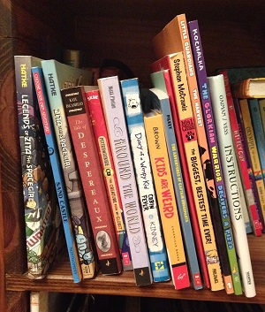 I love the variety of book spines on my kid's bookshelf...